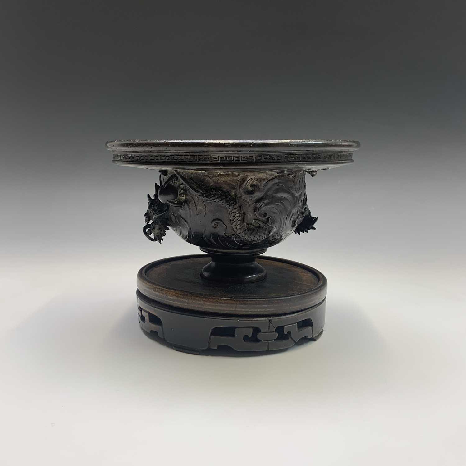 A Chinese bronze bowl, Qing Dynasty, signed, with three claw dragons chasing the flaming pearl, with - Image 6 of 6