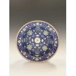A Chinese porcelain bowl, 19th century, the painted blue enamels to the interiro decorated with