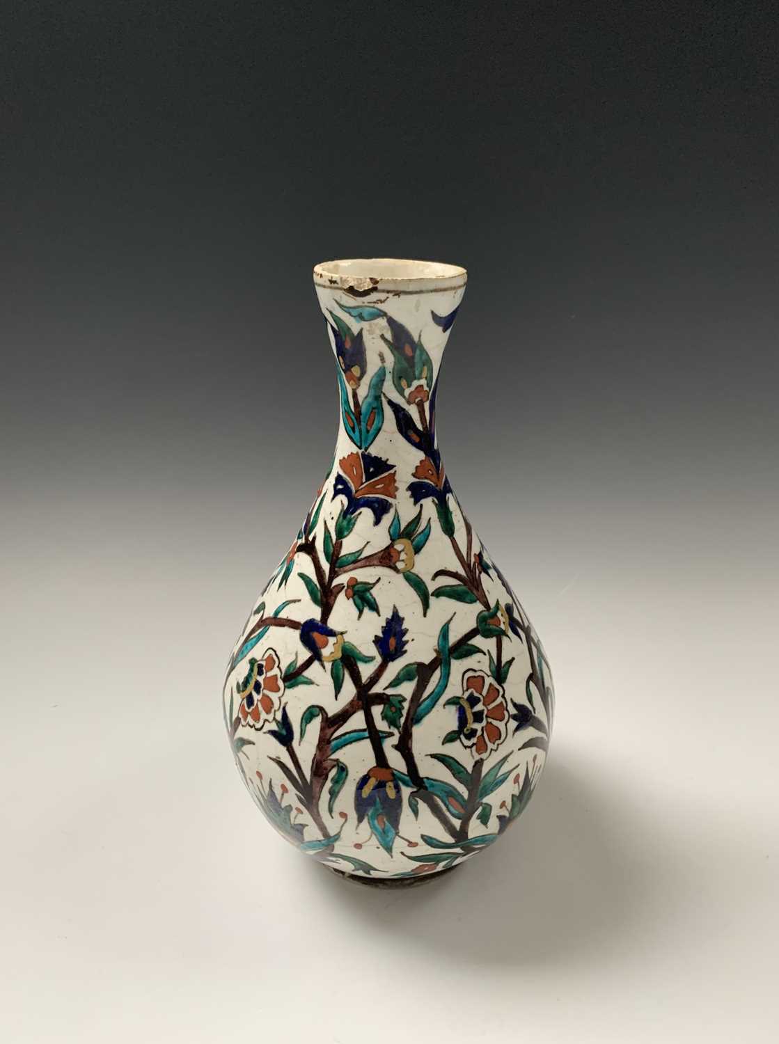 An Iznik pottery vase, 19th century, the bulbous body with a white ground and decorated with - Image 4 of 14