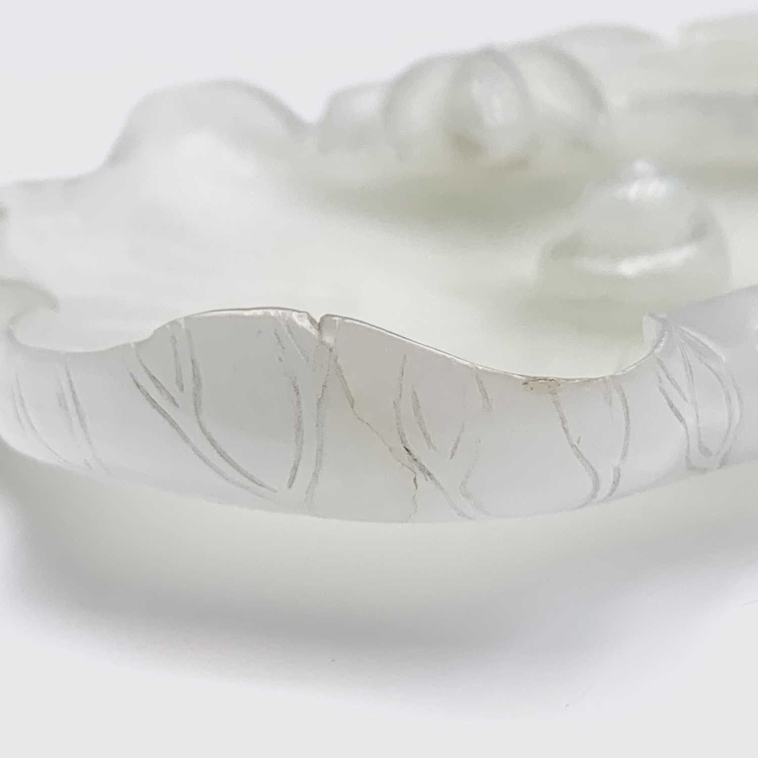 A Chinese white jade 'lotus leaf' brushwasher, 19th Century, height 2.5cm, width 13cm, depth 8.5cm. - Image 20 of 20