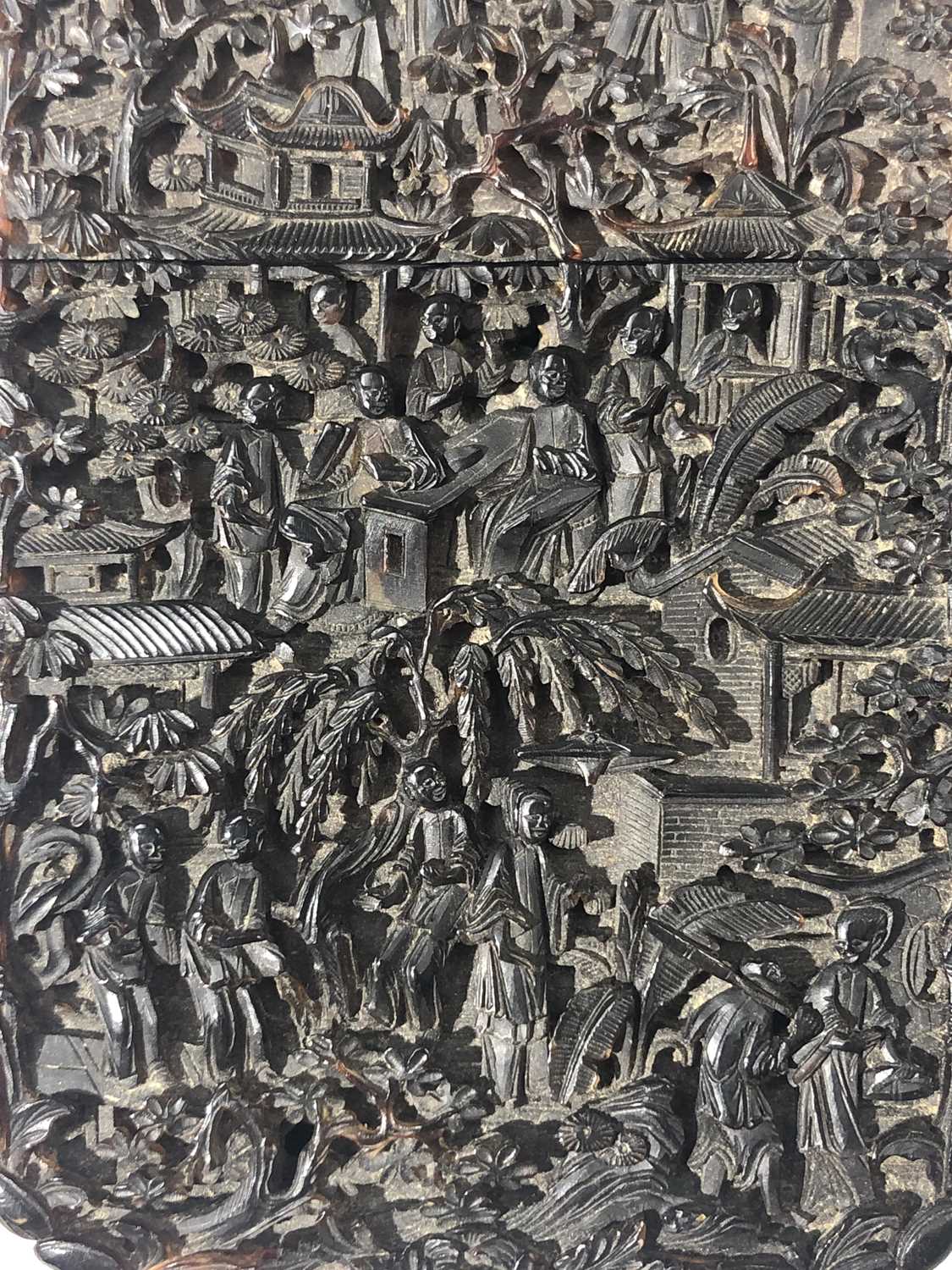 A Chinese tortoiseshell card case, 19th century, intricately carved with figures amongst buildings - Image 4 of 15