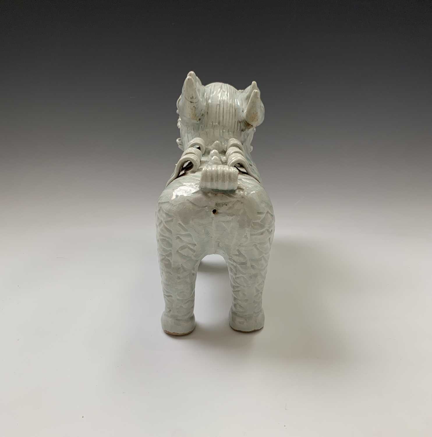 A Chinese celadon glazed pottery dog of fo, early 20th century, .height 23cm, length 28cm,width 11cm - Image 6 of 8