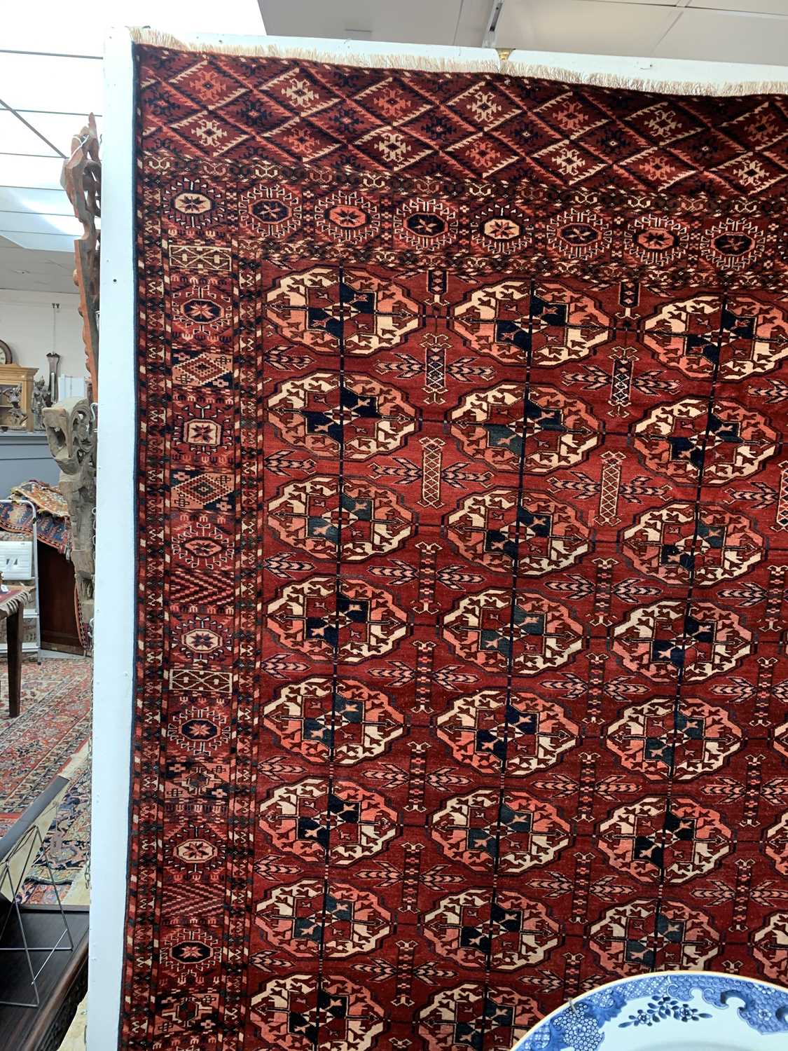 A Tekke carpet, Turkmenistan, circa 1890, the madder field with ten rows of five medallions, - Image 13 of 13