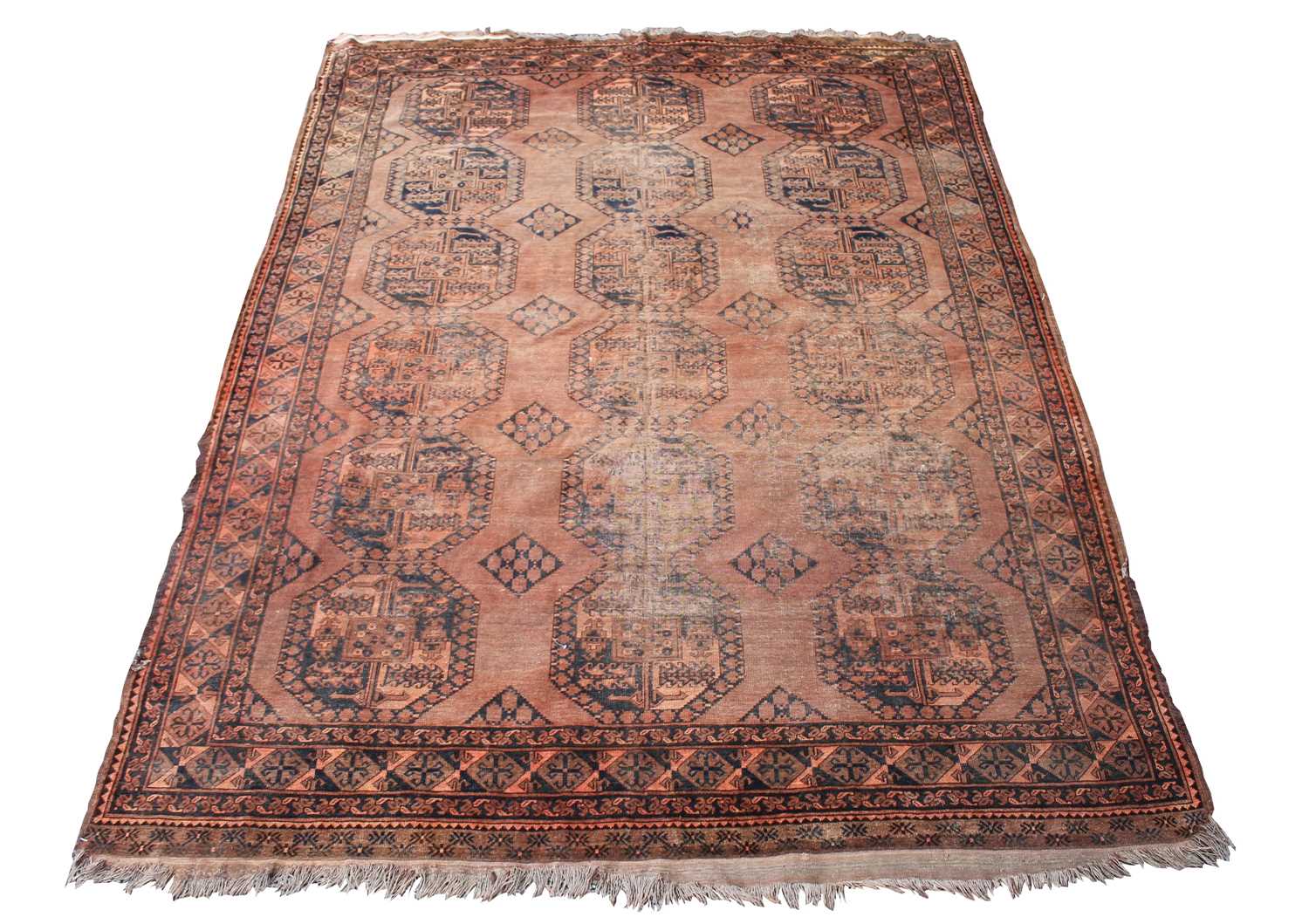 An Afghan Ersari carpet, the camel field with six rows of three octagonal medallions, within a