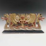 A Thai gilded carved wood panel, 22 x 51cm.