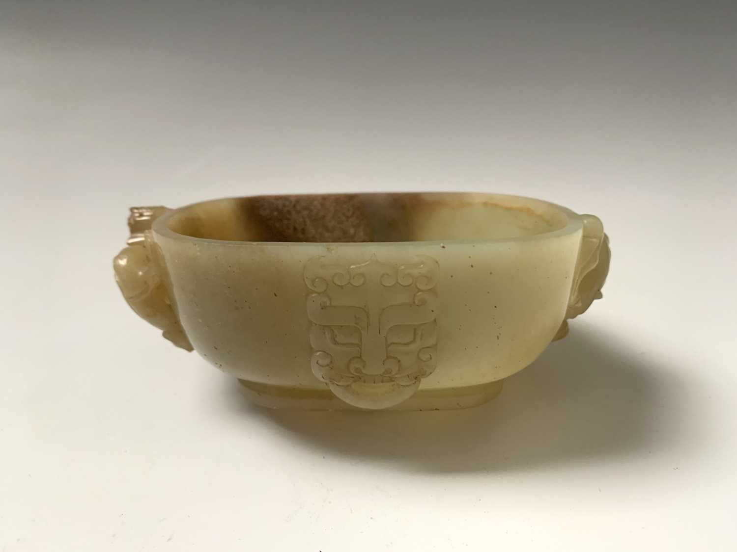 A Chinese jade water pot, 18th century, with twin horned beast handles, the front and rear with - Image 2 of 14