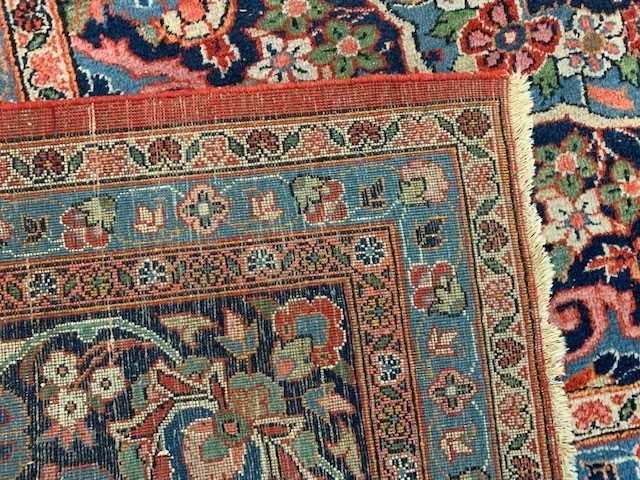 A Kashan Carpet, West Persia, the madder field with a central indigo lobed pole medallion, with - Image 4 of 4