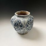 A Chinese blue and white octagonal vase. Yuan style, 20th century, each cartouche filled with a