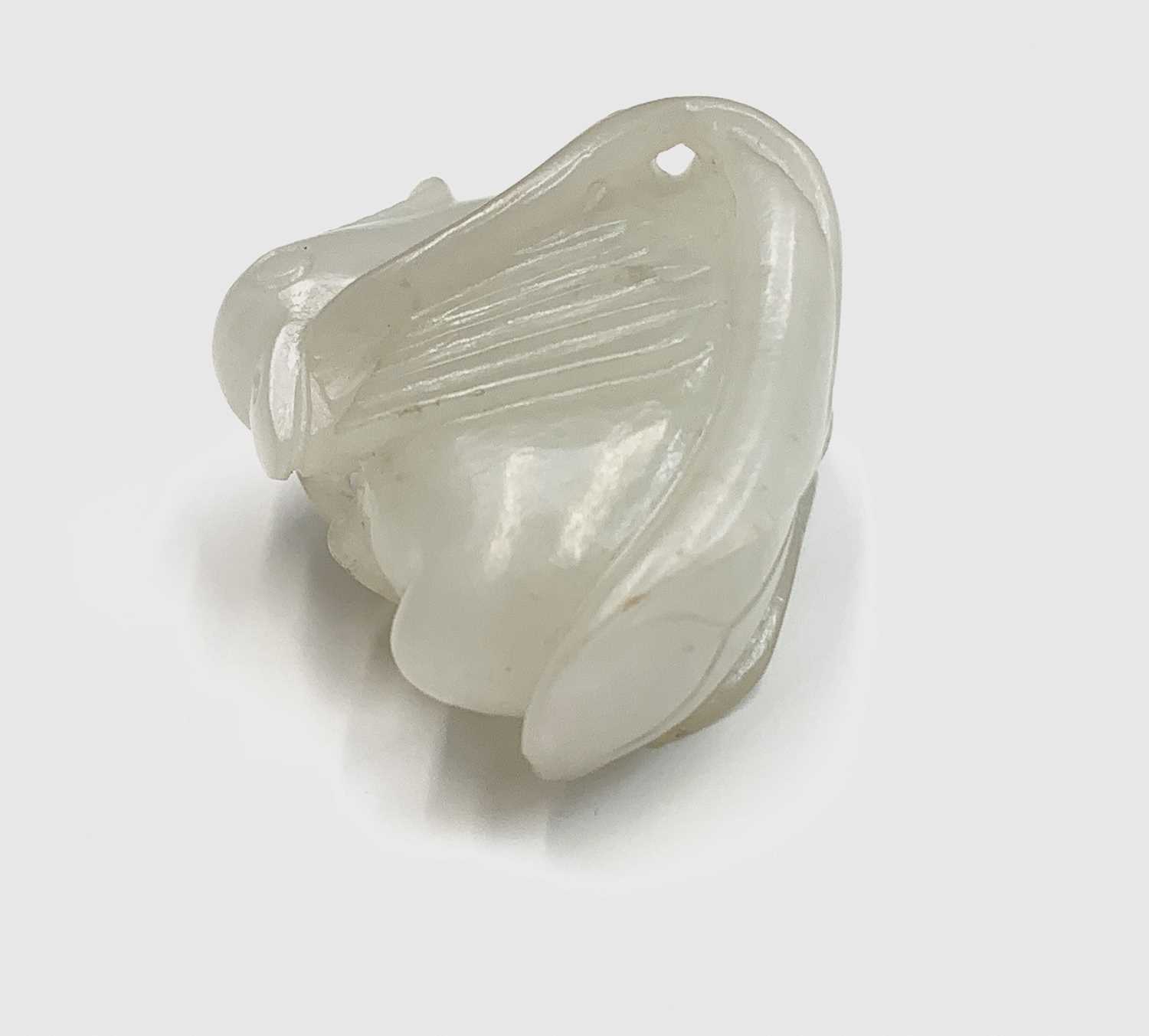 A small Chinese white jade carving of a duck, Qing dynasty, 19th century, height 3cm, width 4.5cm. - Image 7 of 11