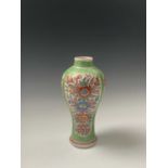 A Chinese famille verte baluster vase, 19th century, the six ivory cartouches filled with