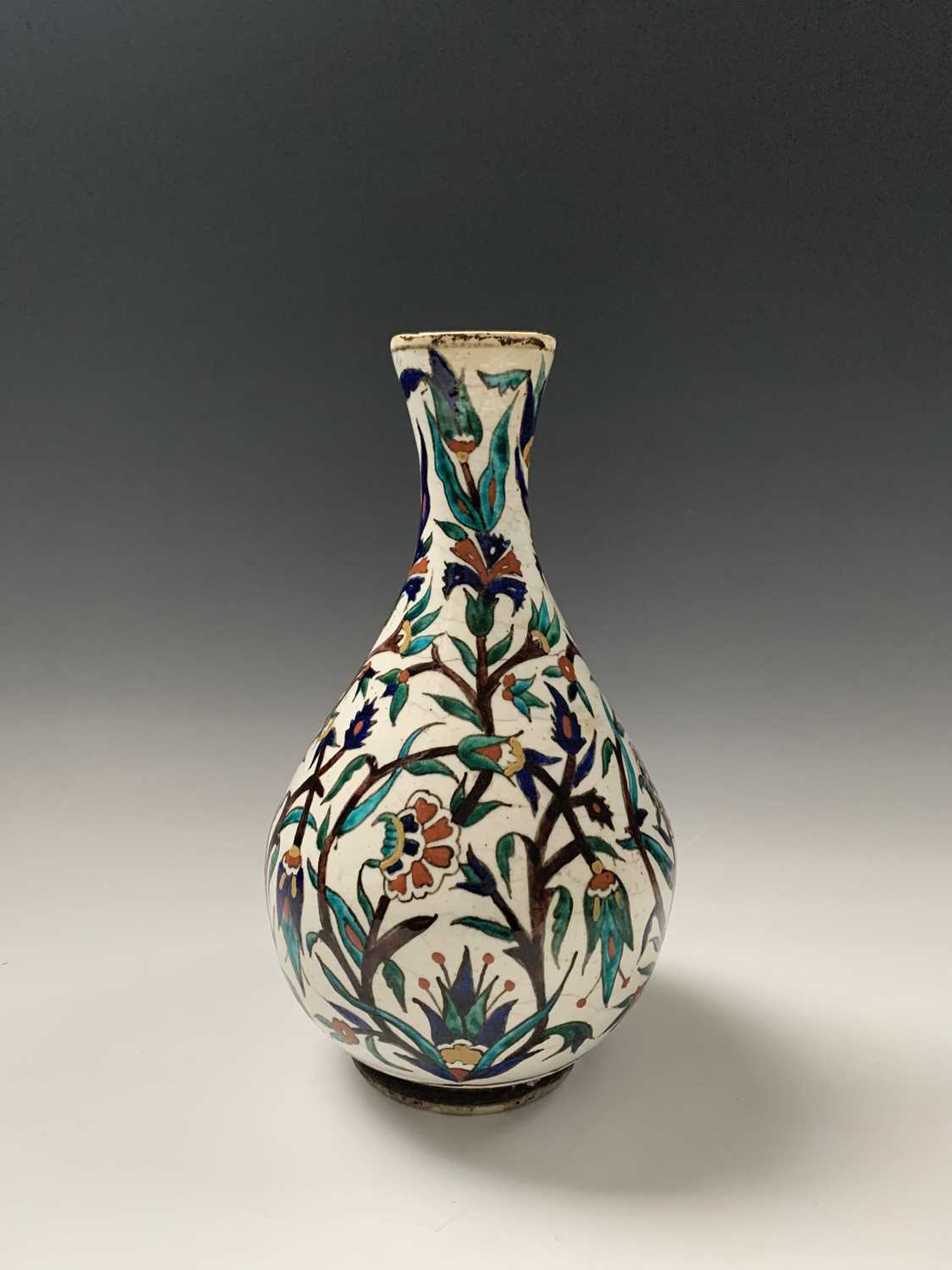 An Iznik pottery vase, 19th century, the bulbous body with a white ground and decorated with - Image 2 of 14