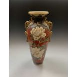 A large Japanese Satsuma vase, Meiji Period, with a pair of gilt decorated and butterfly moulded