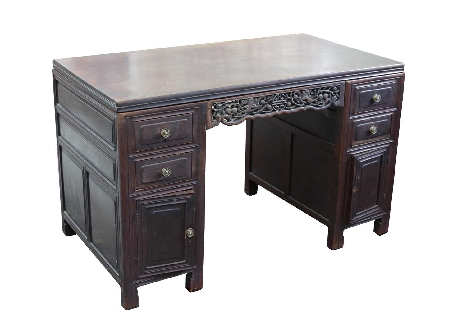 A Chinese hardwood twin pedestal desk, late 19th century, with bat and roundel carved stretchers,
