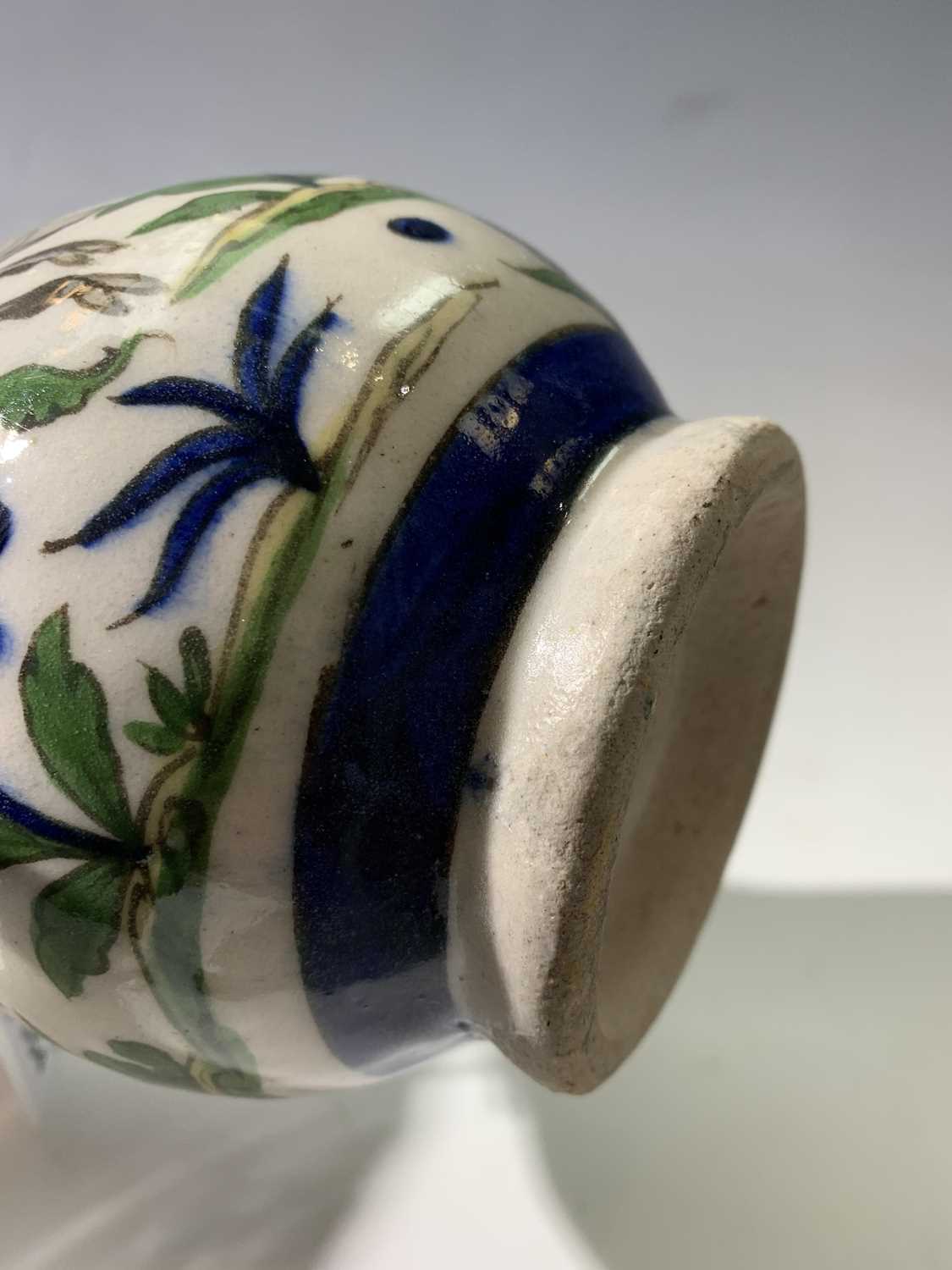 A Persian pottery bottle vase, circa 1900, the white ground with wild boar amongst stylised - Image 8 of 13