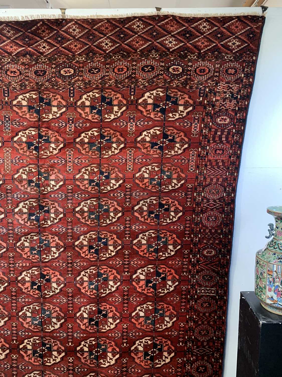 A Tekke carpet, Turkmenistan, circa 1890, the madder field with ten rows of five medallions, - Image 6 of 13