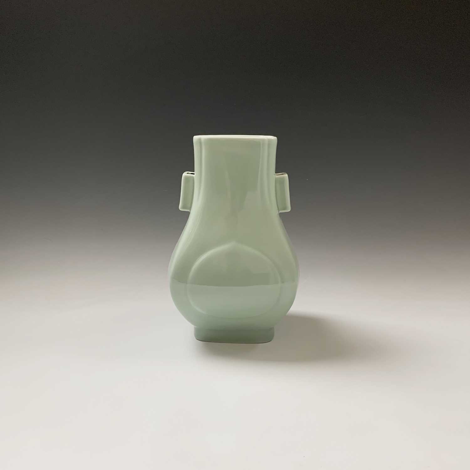 A Chinese celadon hu-form vase, Guangxu Period, with square section lug handles, six character marks