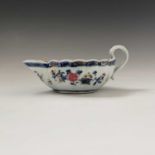 A Chinese famille rose 'tobacco-leaf' sauce boat, Qianlong Period, height 9cm, length 19.5cm,