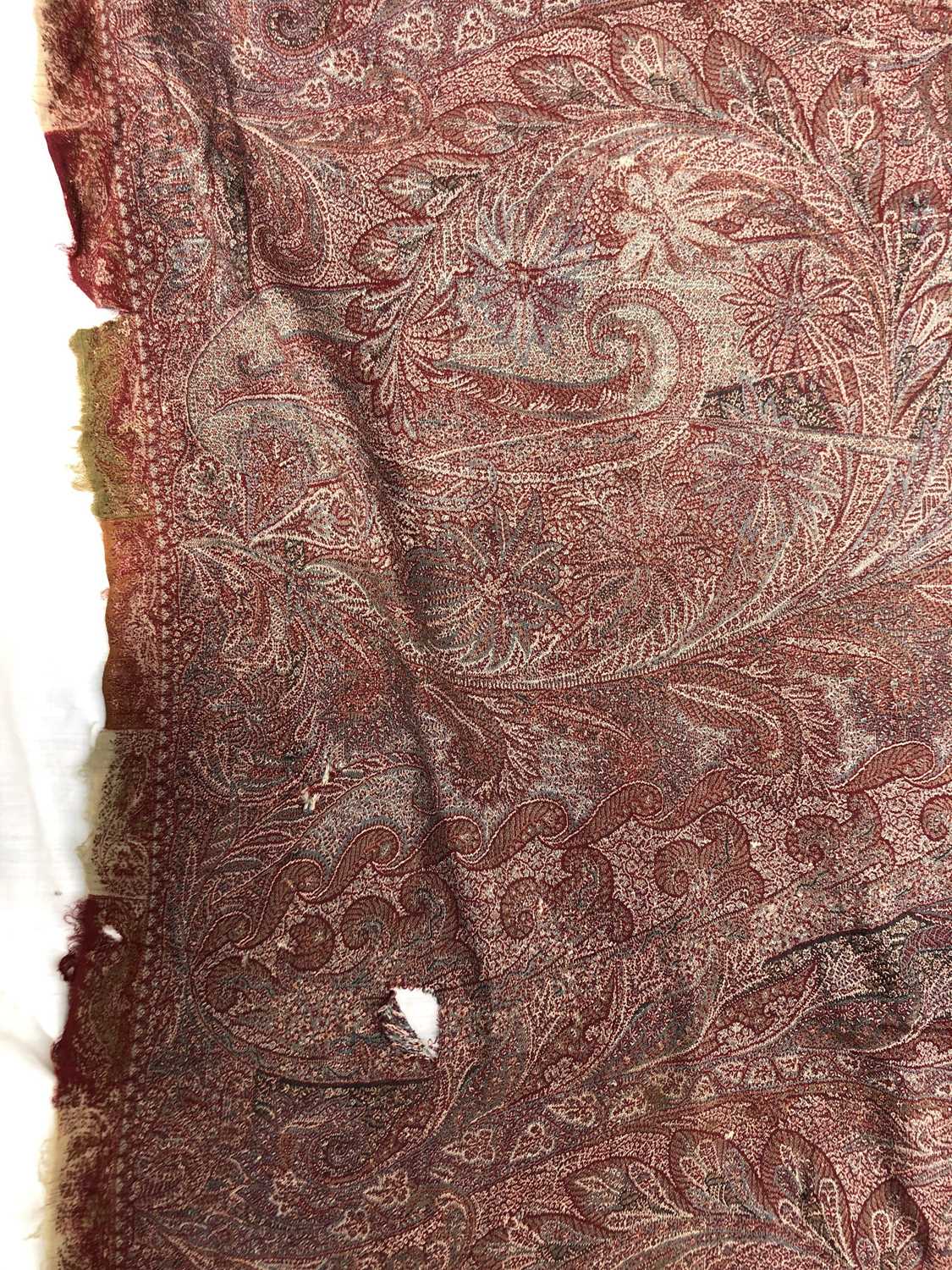 A large woven paisley shawl, 255 x 164cm.Condition report: Tears and holes of various sizes - Image 6 of 7