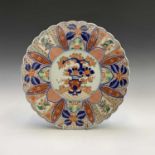 A Japanese Imari porcelain charger, late 19th century, diameter 31cm.