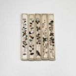 Five Japanese shibayama cutlery handles, 19th century, each inlaid with flowering plants, birds