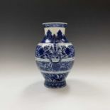 A Chinese blue and white porcelain archaistic hu-form vase, Qianlong seal mark in underglaze blue,
