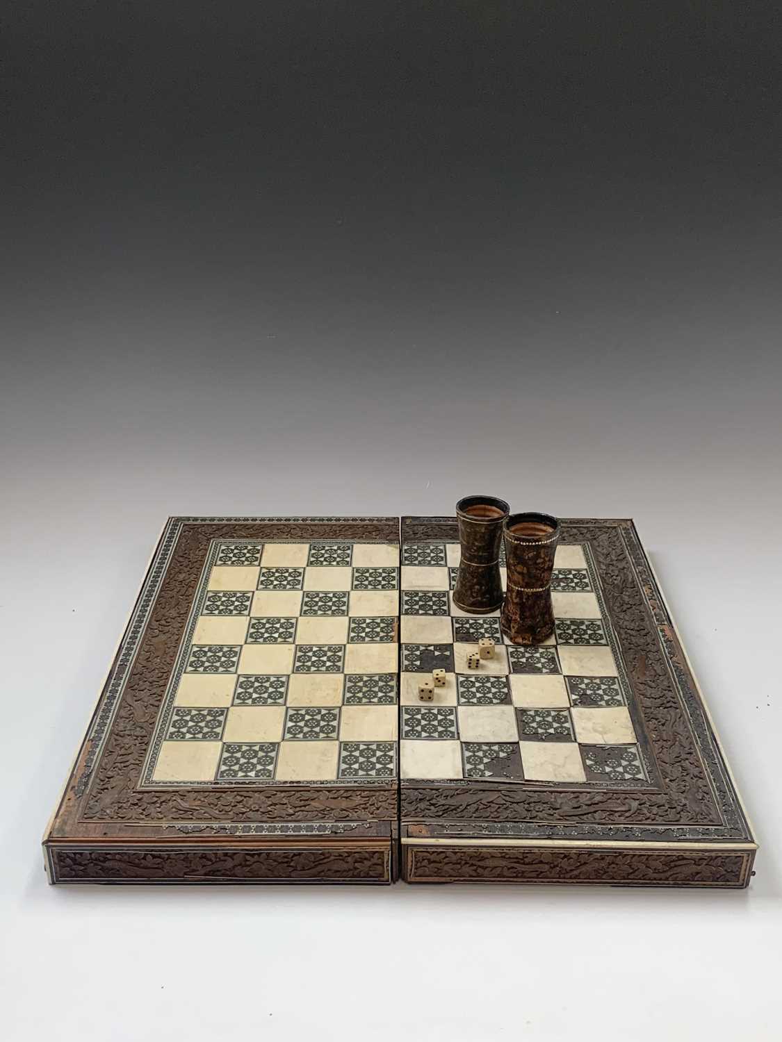 An Anglo-Indian sandalwood games board, 19th century, with ivory and sadeli chess squares within a - Image 3 of 6