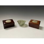 A pair of Chinese wooden boxes, each mounted with floral carved jade panels, height 5.5cm, length