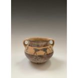 A Chinese Neolithic earthenware pot, with twin handles, the ovoid body painted with geometric