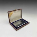 A Thailand sterling silver and niello cigarette case, stamped, inscribed to the rear 'With