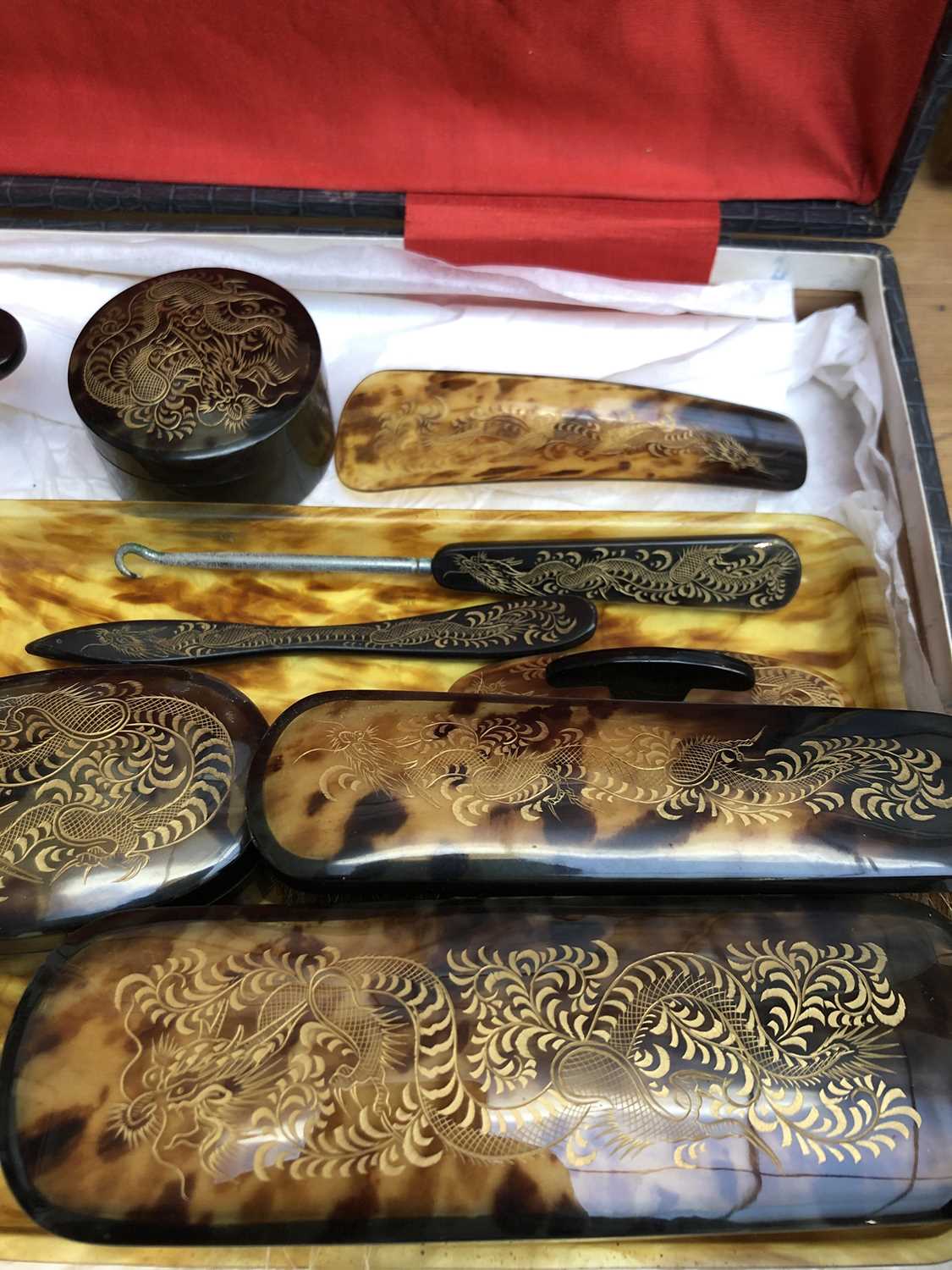 A Chinese faux tortoiseshell dressing table set, early 20th century, gilt decorated with stylised - Image 5 of 7