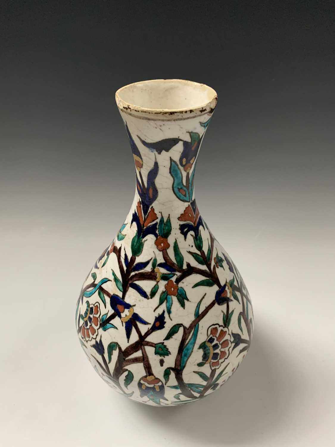 An Iznik pottery vase, 19th century, the bulbous body with a white ground and decorated with - Image 7 of 14