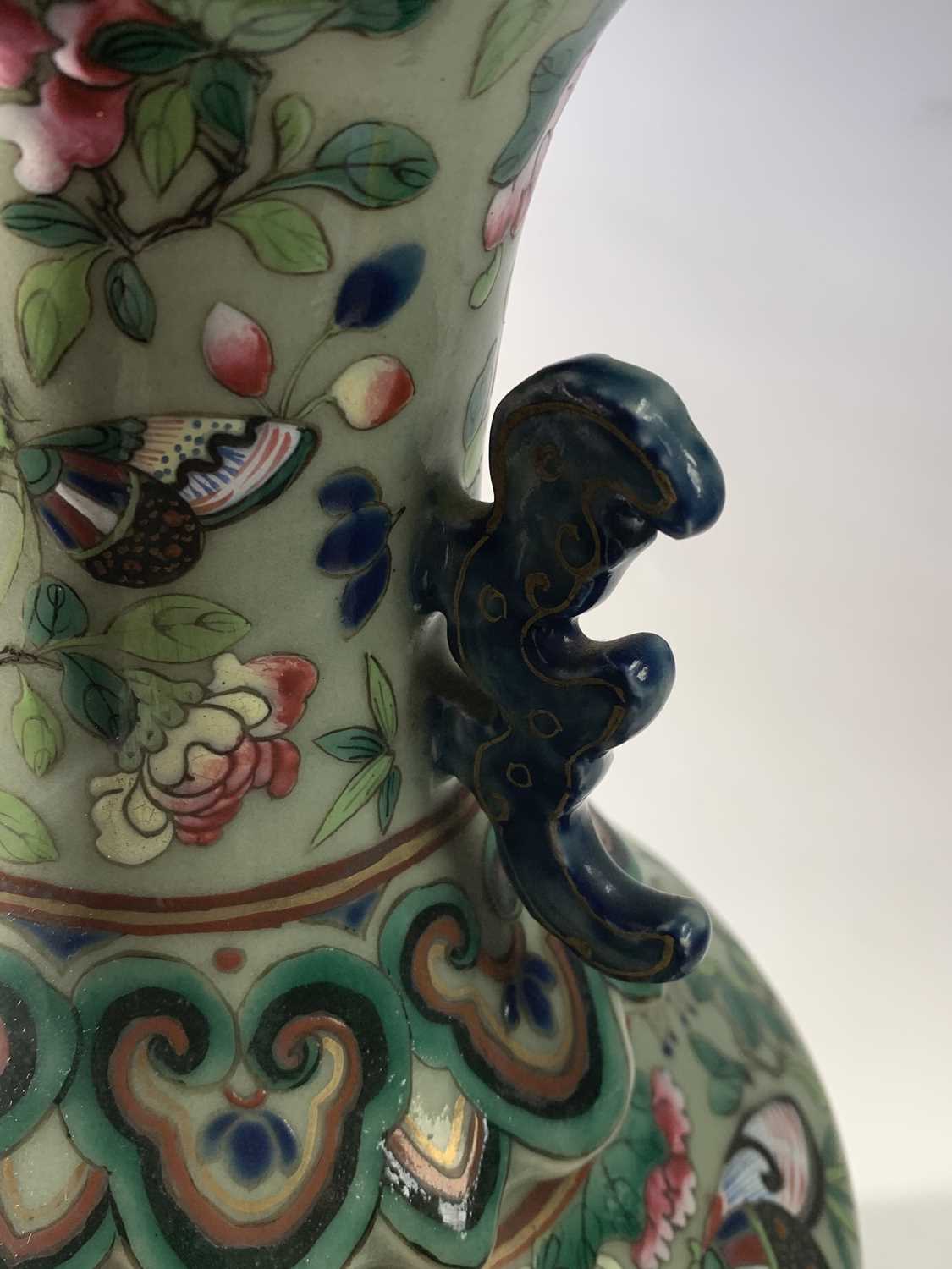 A Chinese Canton twin-handled celadon vase, 19th century, with butterflies amongst foliage above - Image 8 of 27