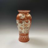 A Japanese kutani porcelain vase, 19th century, with panels of birds in flight amongst flowering
