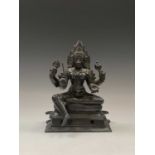 An Indian bronze figure of a seated goddess, 19th century, height 29cm.Condition report: Provenance: