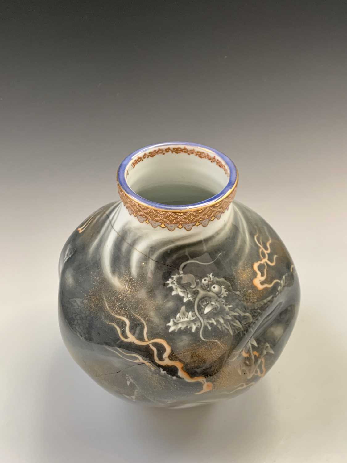 A Japanese porcelain vase, Meiji Period, the dimpled body decorated with stylised dragons, height - Image 2 of 6