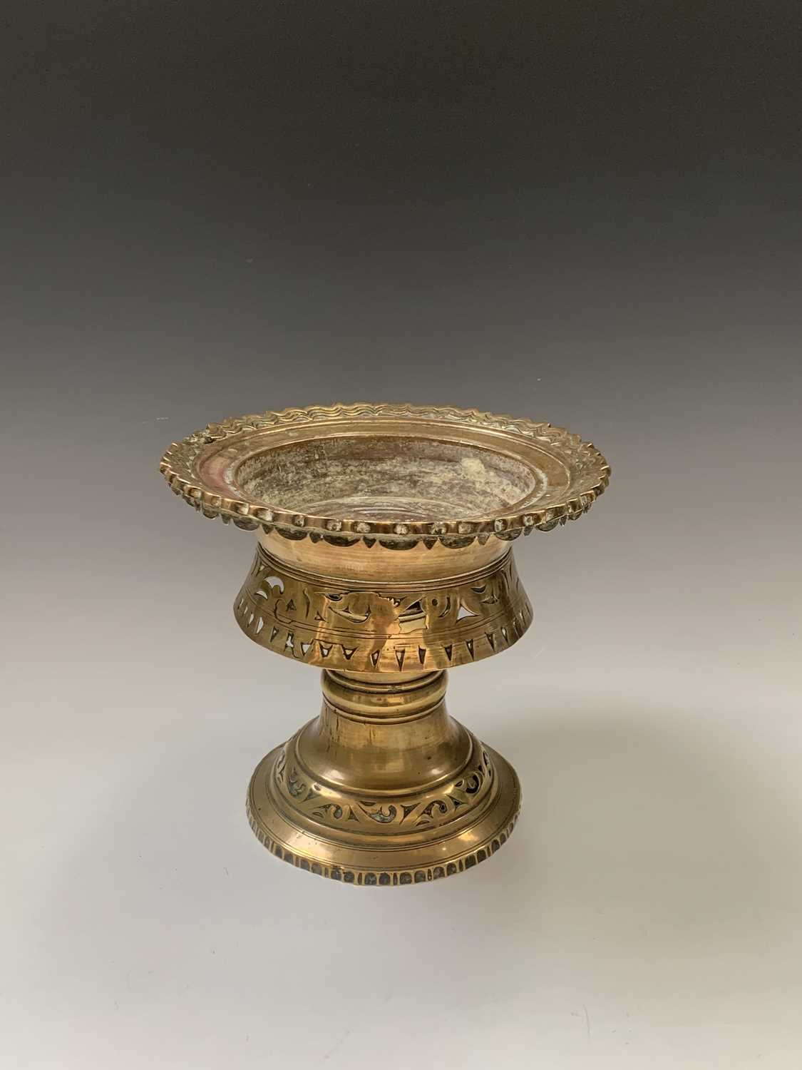 A Burmese circular pierced brass stand, 19th century, height 22.5cm, diameter 24.5cm and a bronze - Image 2 of 7