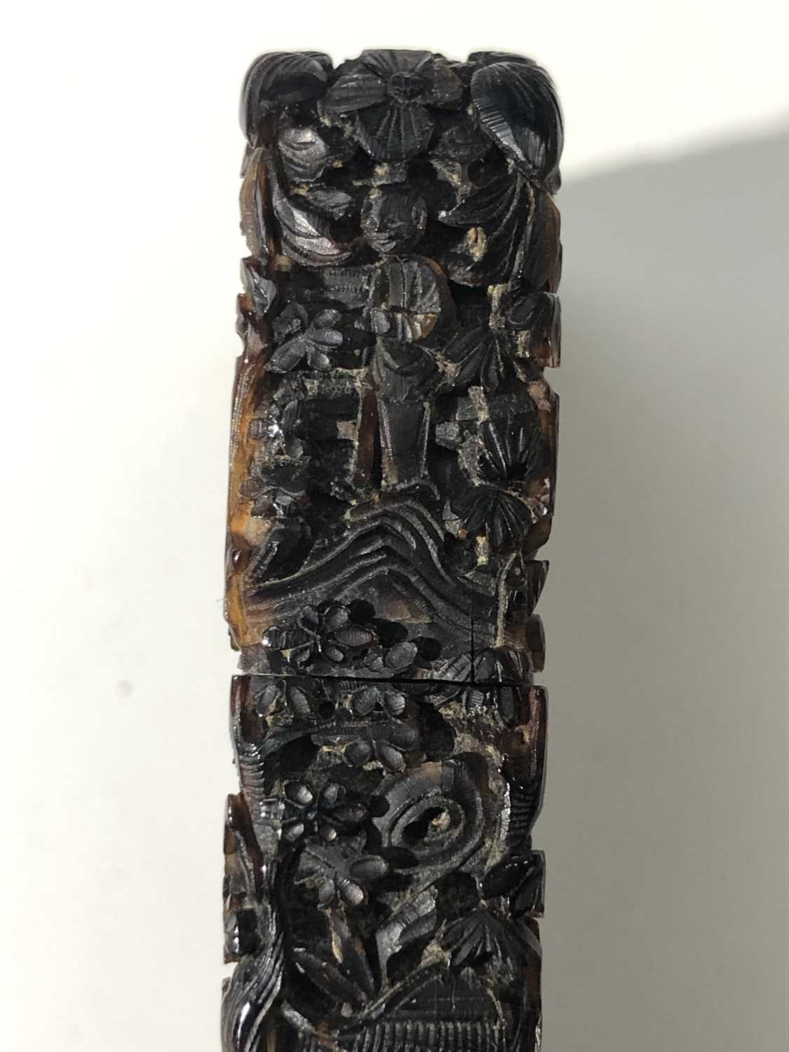 A Chinese tortoiseshell card case, 19th century, intricately carved with figures amongst buildings - Image 6 of 15