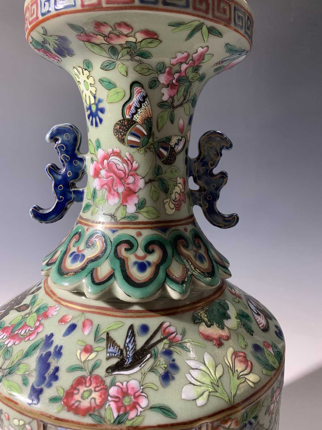 A Chinese Canton twin-handled celadon vase, 19th century, with butterflies amongst foliage above - Image 21 of 27