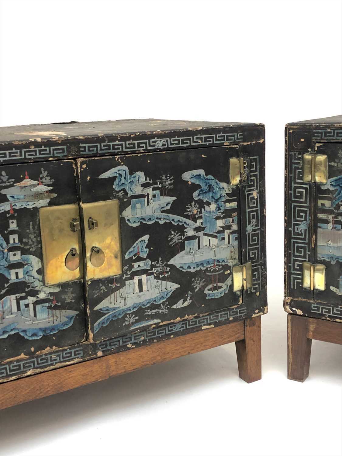 A pair of Chinese lacquered wood and painted cabinets, early 20th century, on later oak stands, - Image 2 of 6