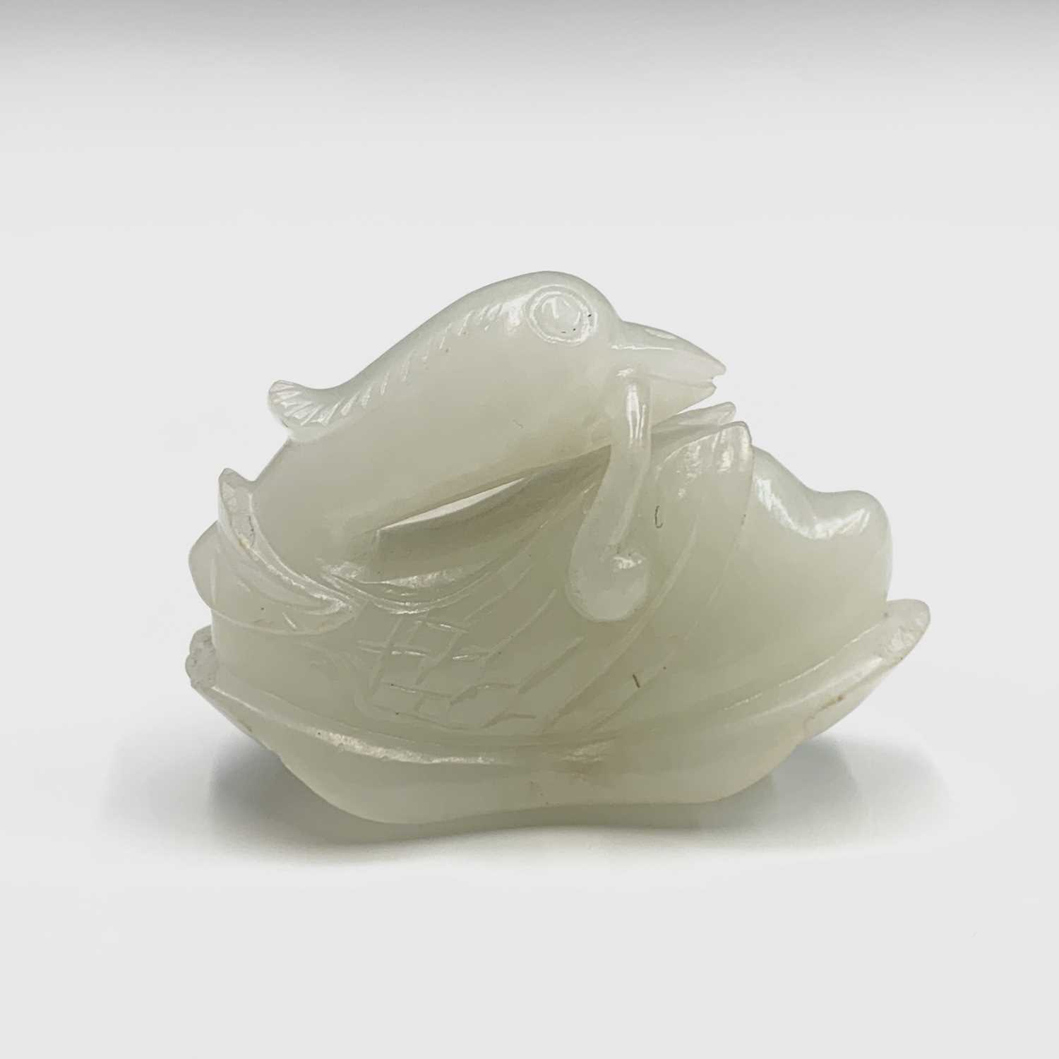 A small Chinese white jade carving of a duck, Qing dynasty, 19th century, height 3cm, width 4.5cm. - Image 8 of 11