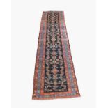 A Hamadan runner, North West Persia, the charcoal field with the all over herati pattern and