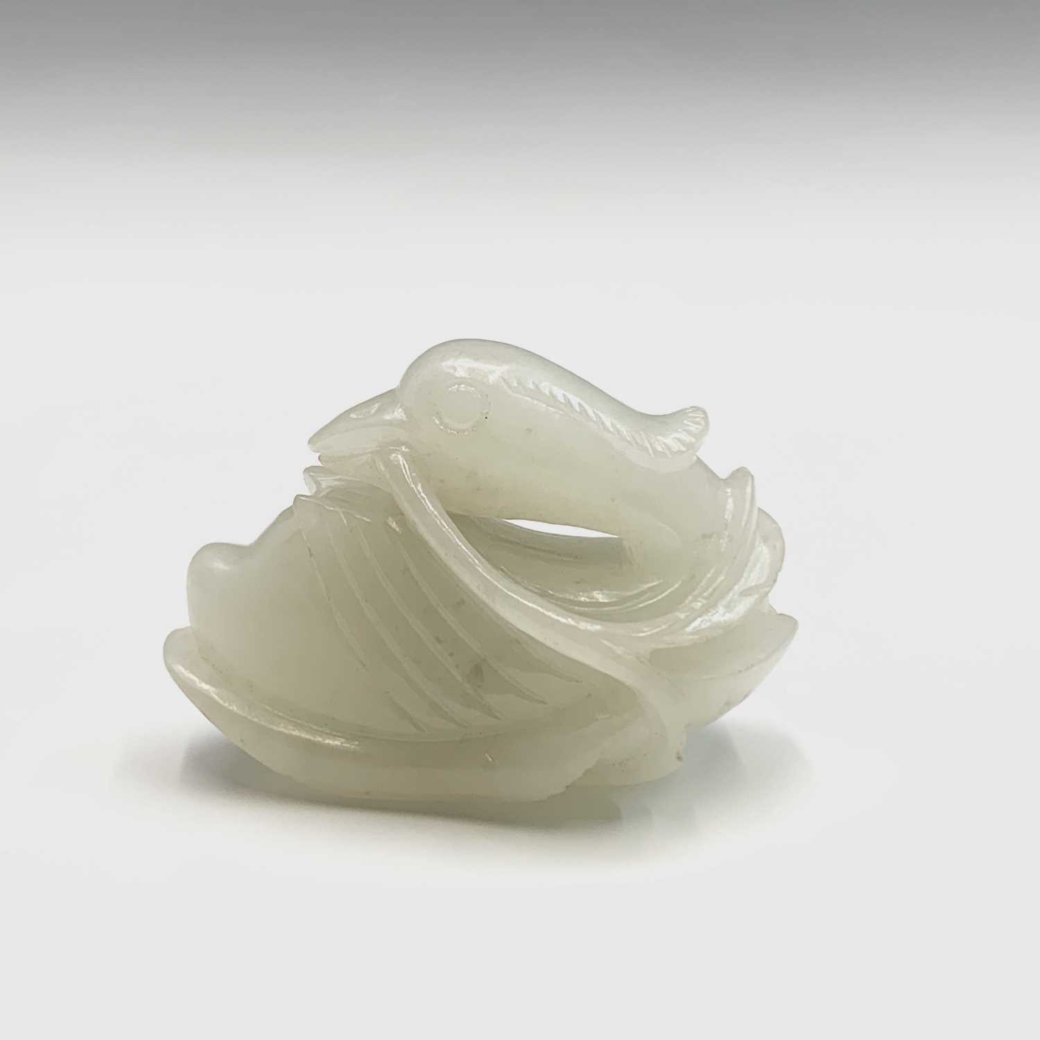 A small Chinese white jade carving of a duck, Qing dynasty, 19th century, height 3cm, width 4.5cm. - Image 4 of 11