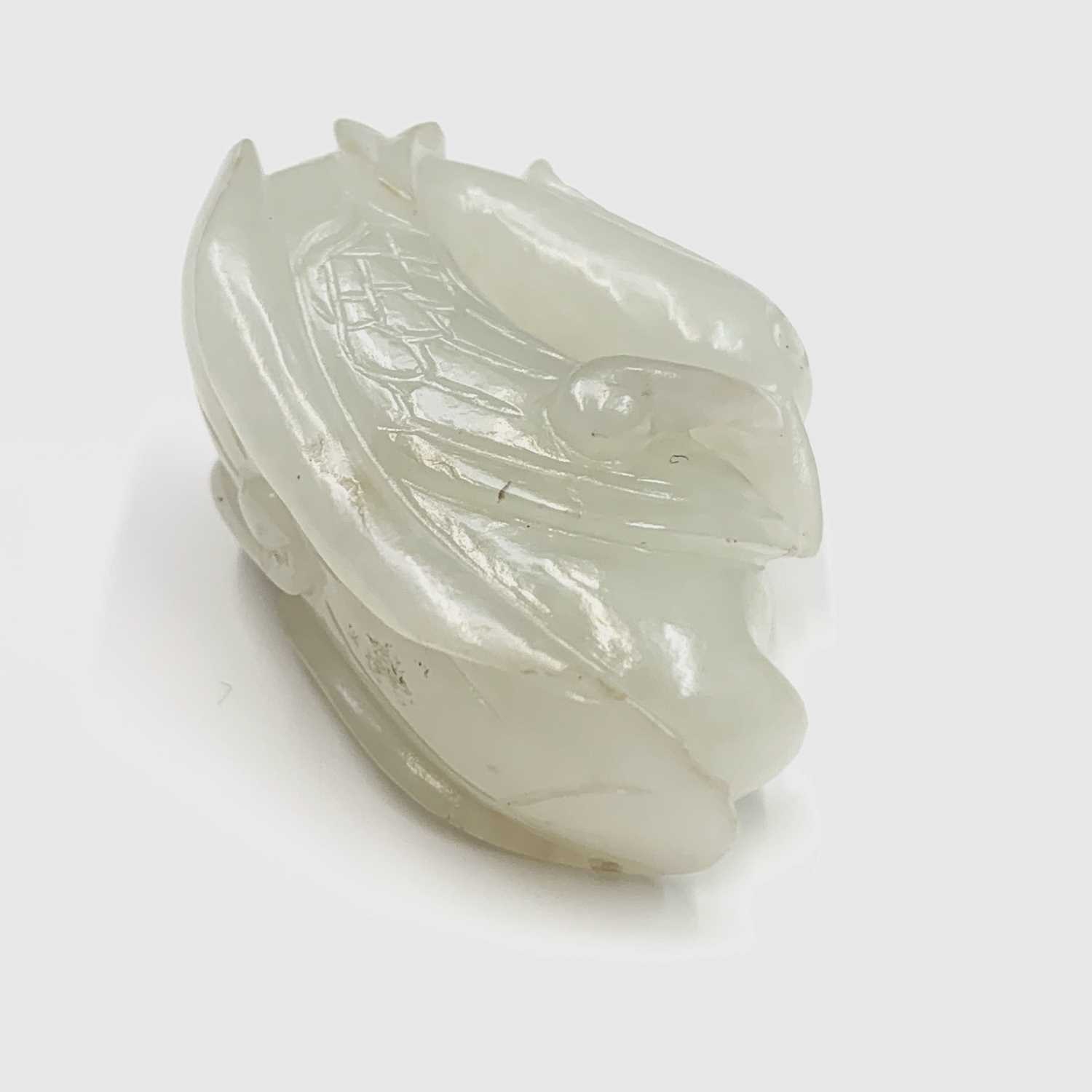 A small Chinese white jade carving of a duck, Qing dynasty, 19th century, height 3cm, width 4.5cm. - Image 6 of 11