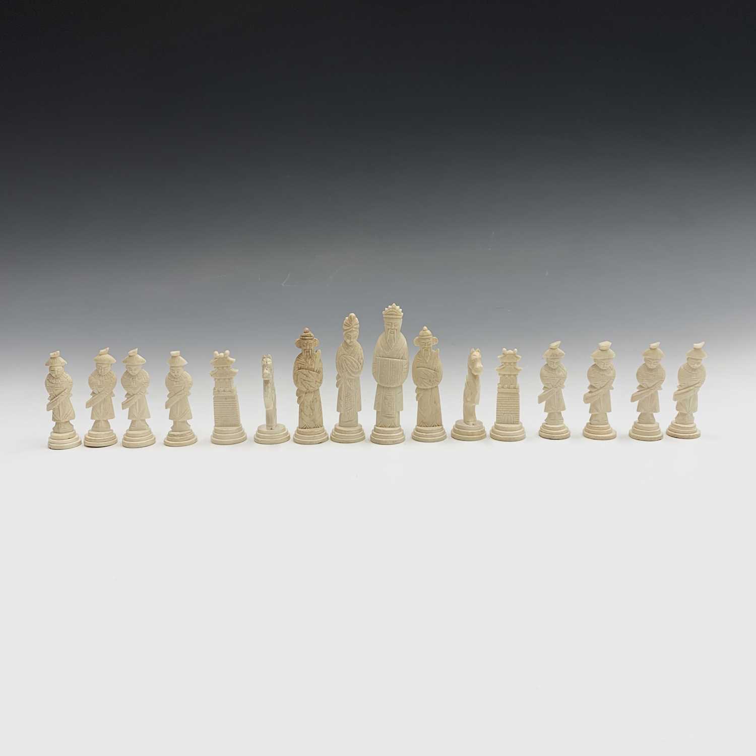 A Chinese bone and red stained composition chess set, boxed, height of kings 9.5cm. - Image 8 of 8