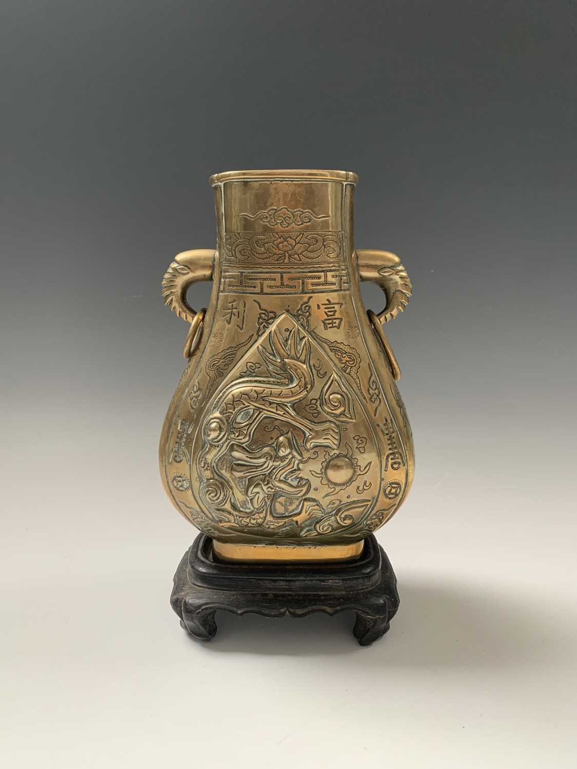 A pair of Chinese bronze pear-shaped vases, circa 1900, each with a dragon chasing the pearl to - Image 3 of 10