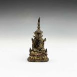 An early Indian miniature gilt bronze figure of a buddha, height 8cm.