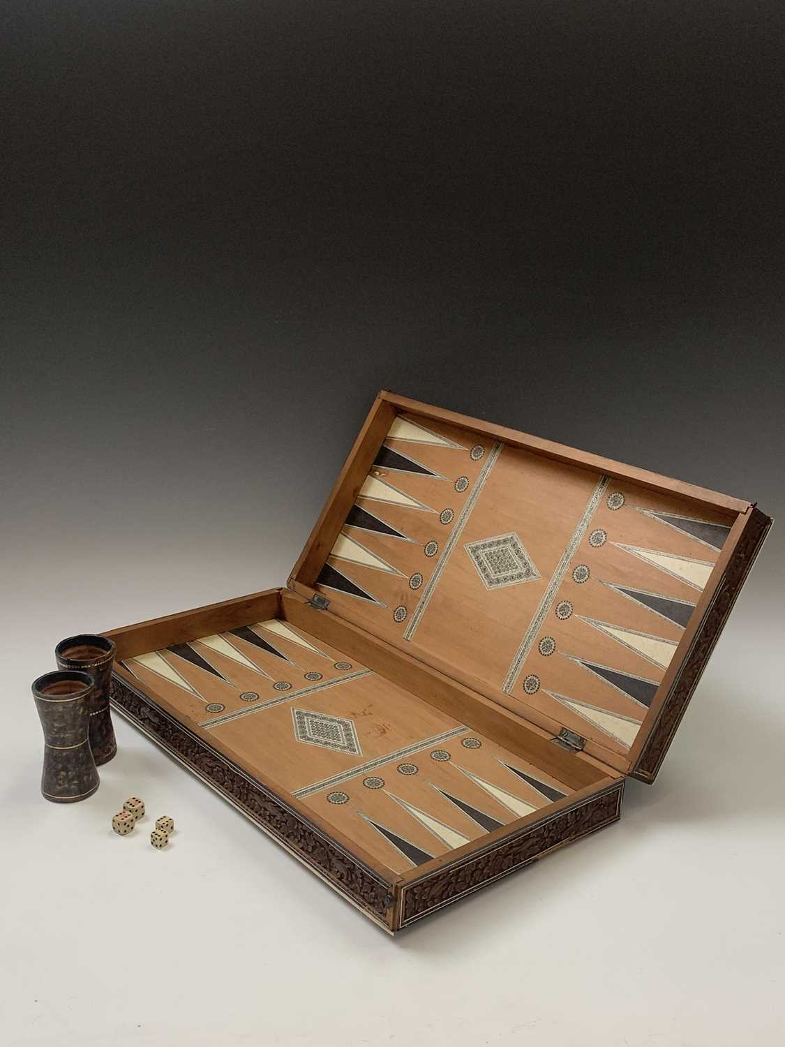 An Anglo-Indian sandalwood games board, 19th century, with ivory and sadeli chess squares within a - Image 2 of 6