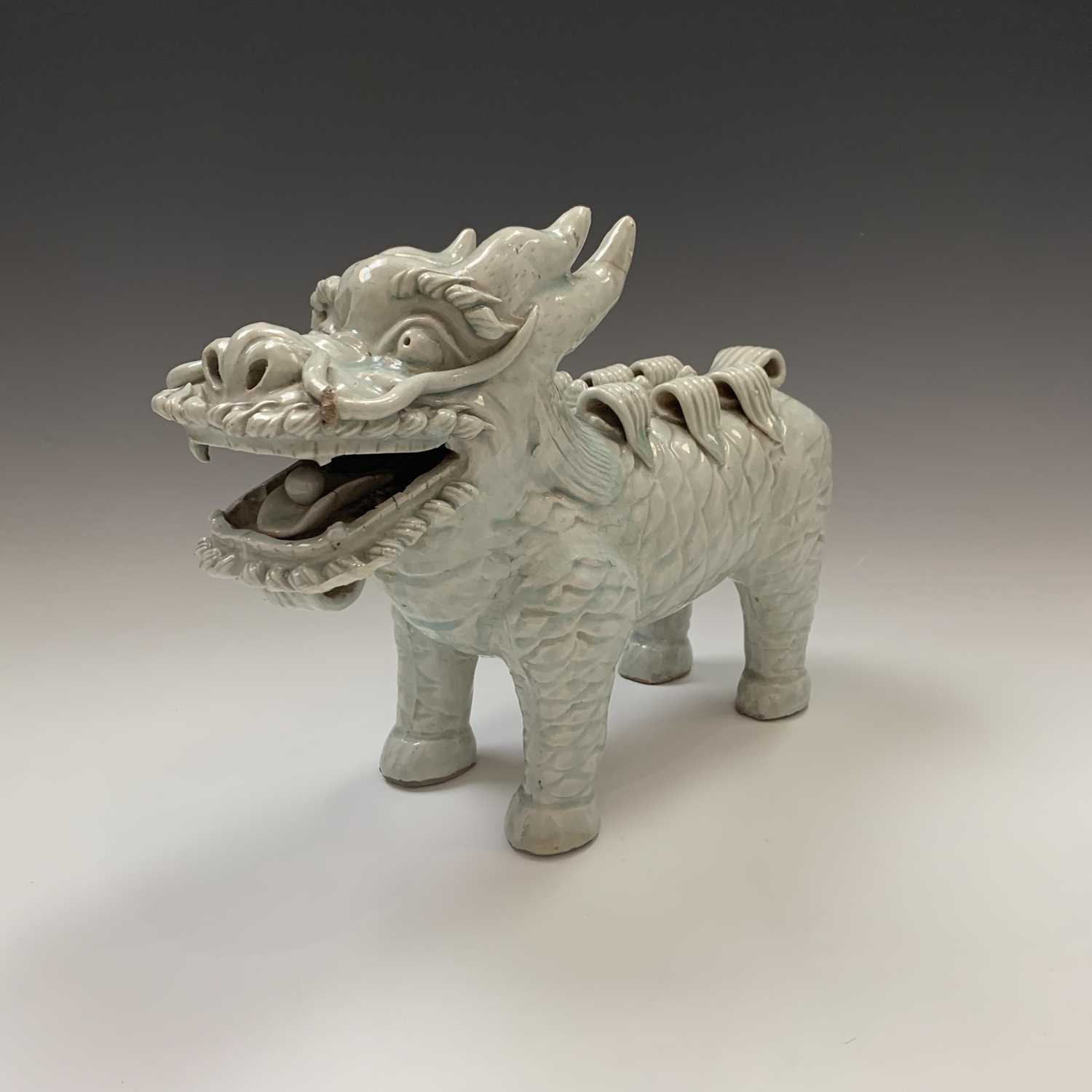 A Chinese celadon glazed pottery dog of fo, early 20th century, .height 23cm, length 28cm,width 11cm - Image 8 of 8