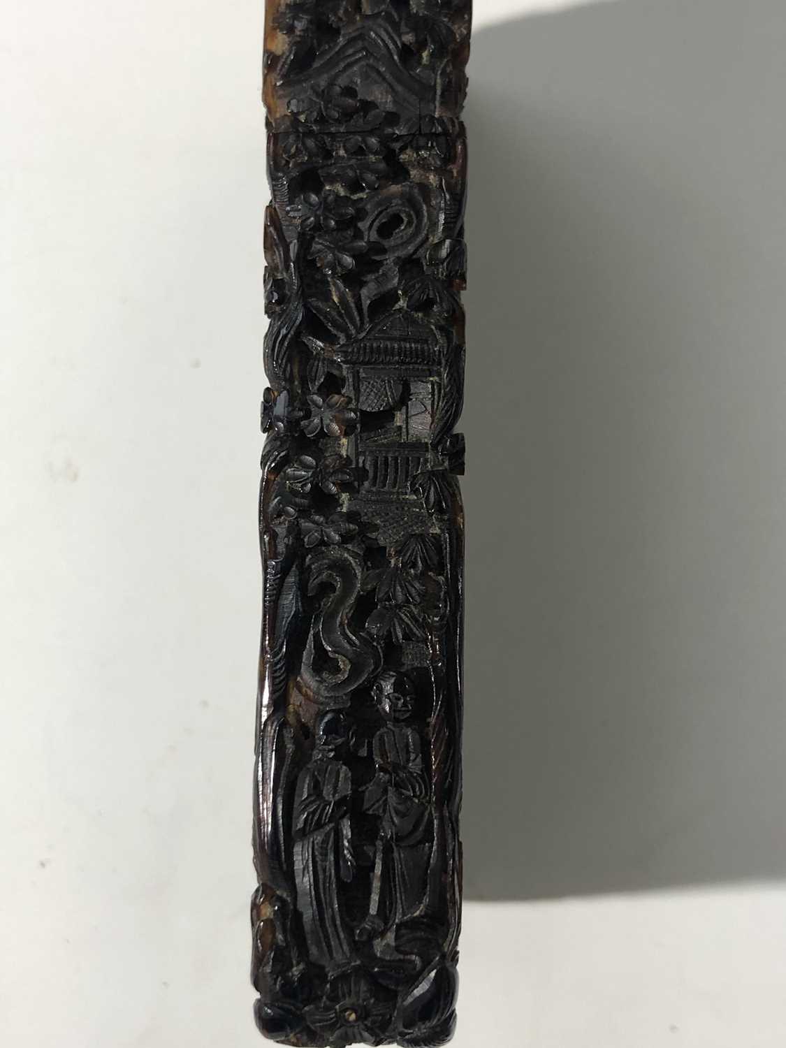 A Chinese tortoiseshell card case, 19th century, intricately carved with figures amongst buildings - Image 7 of 15