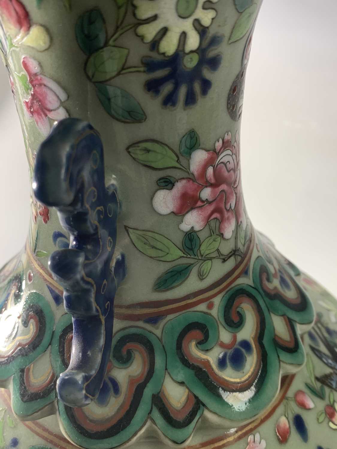 A Chinese Canton twin-handled celadon vase, 19th century, with butterflies amongst foliage above - Image 11 of 27